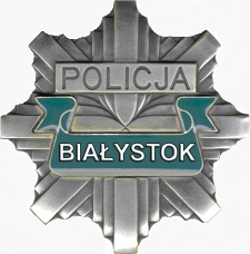 Zdjęcie przedstawia gwiazdę z napisem Policja Białystok